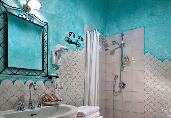 blue bathroom corallo apartment