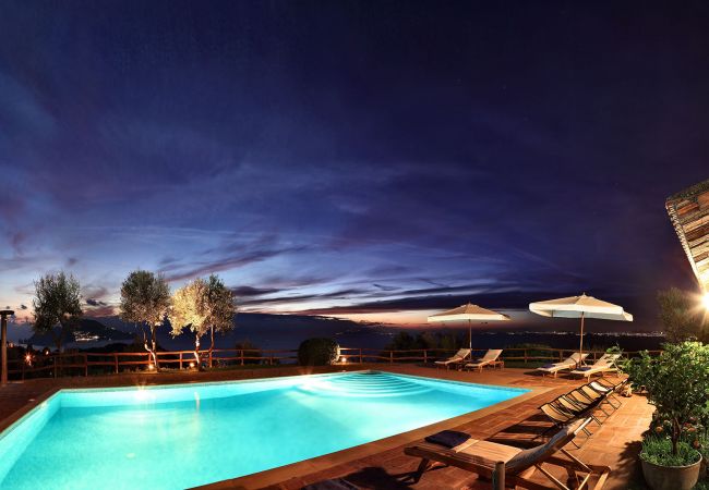 illuminated pool at evening, casale la torre, holiday apartments near sorrento, massa lubrense, italy
