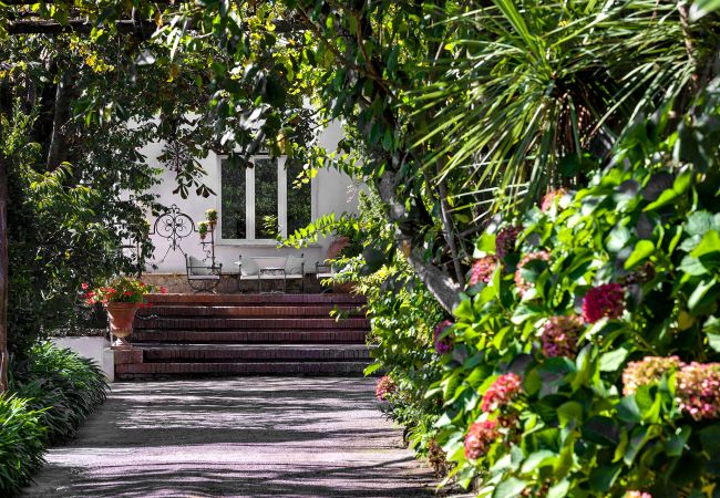 entrance, by the garden, to the vacation villa la casa bianca, massa lubrense, italy