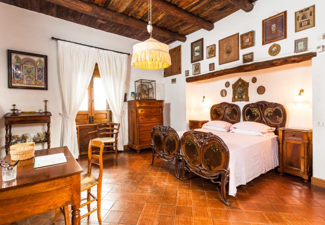 bright and wide twin bedroom, wood style, villa mellicata, massa lubrense, italy