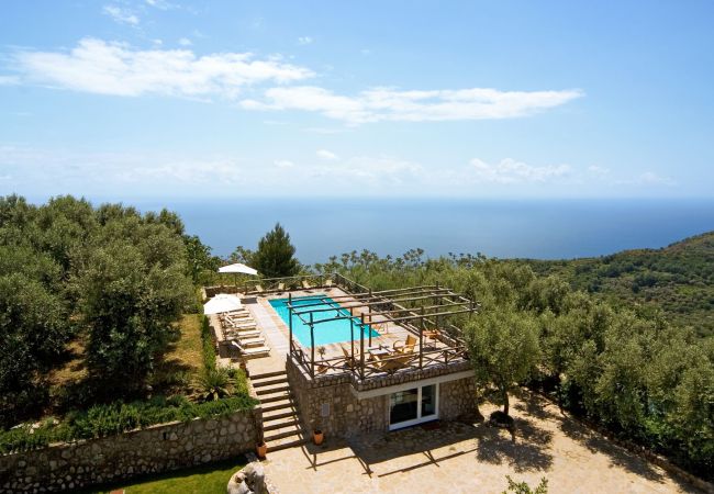 panoramic view of pool area,sea and olive trees, holiday apartment turandot, sant’agata sui due golfi, italy