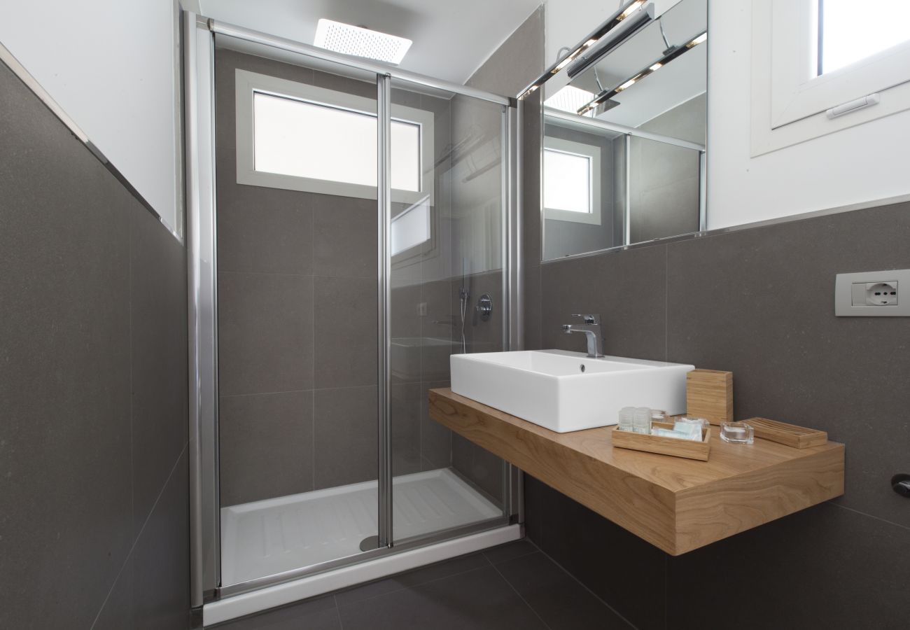 modern bathroom with shower cabin, holiday apartment green suite, sorrento, italy